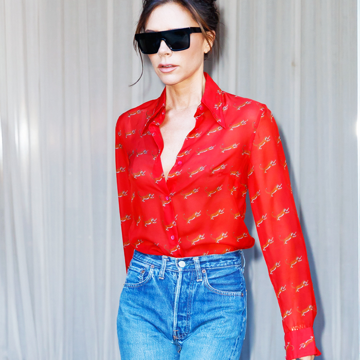Victoria Beckham Style: VB wearing a red shirt and jeans