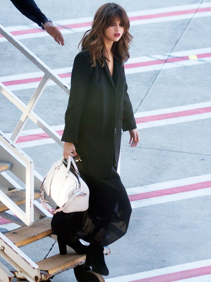 Selena Gomez Carries Louis Vuitton Wallet in Los Angeles
