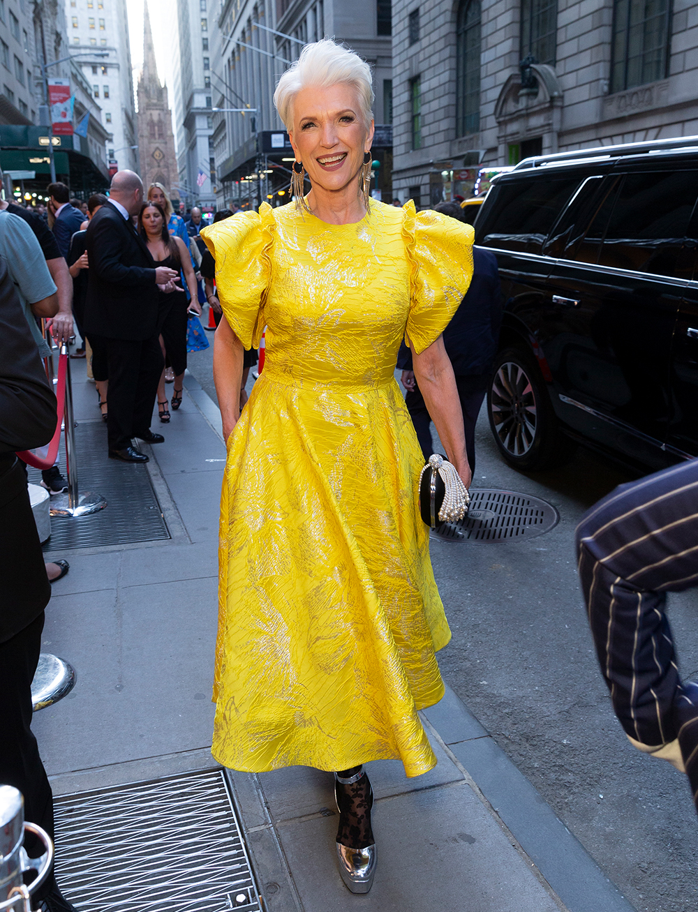 over 50 fashion and clothing inspiration: Maye Musk wearing a yellow brocade dress with silver shoes