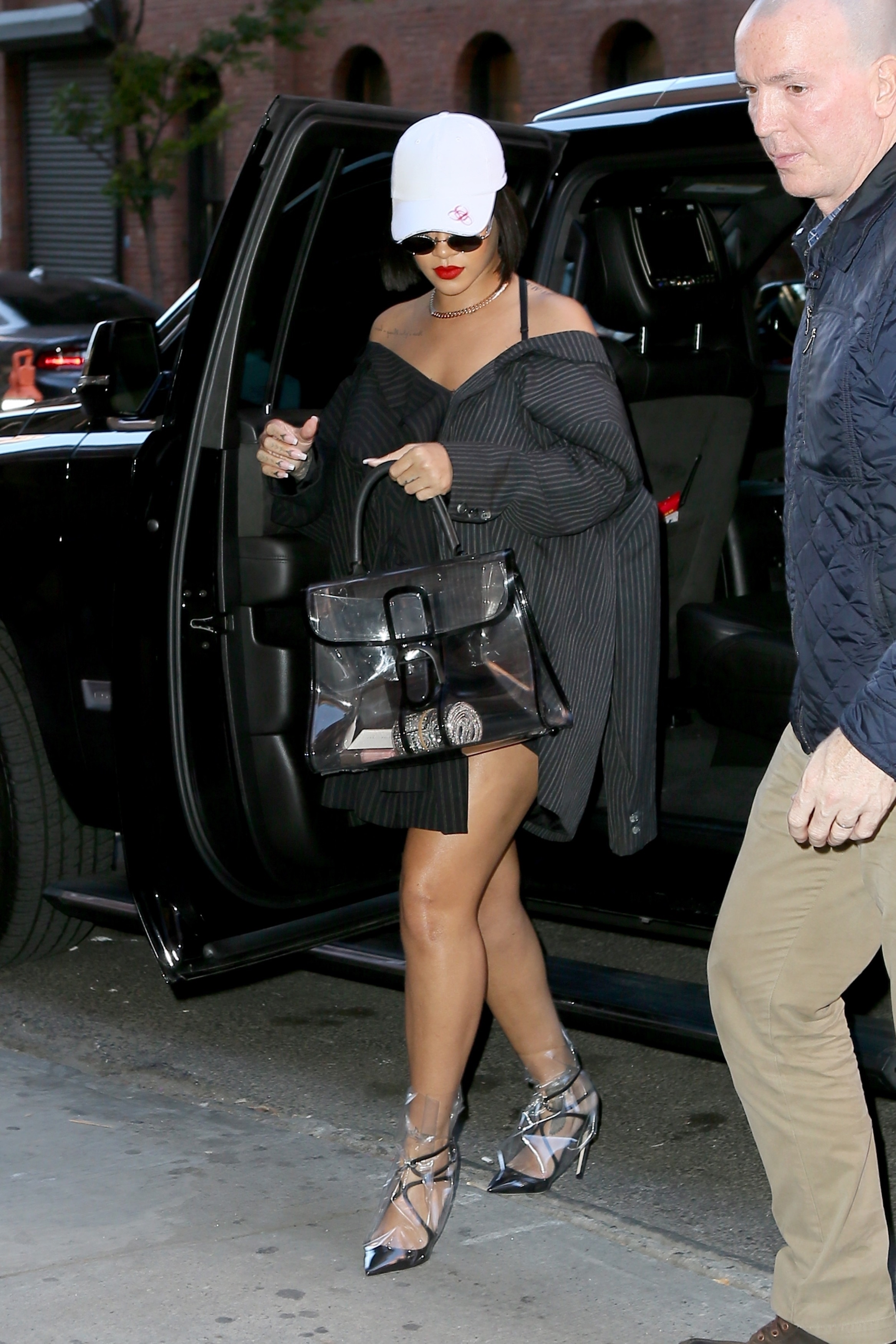 Rihanna wearing clear heels.