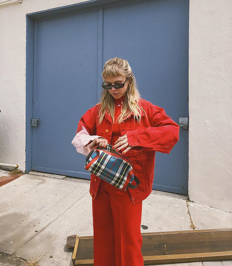 Denim-on-denim trend 2018: Courtney Trop wearing a red set