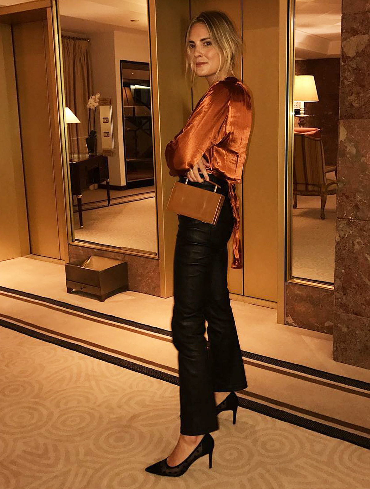 What to Wear to a Company Christmas Party: Clash your textures with satin and leather