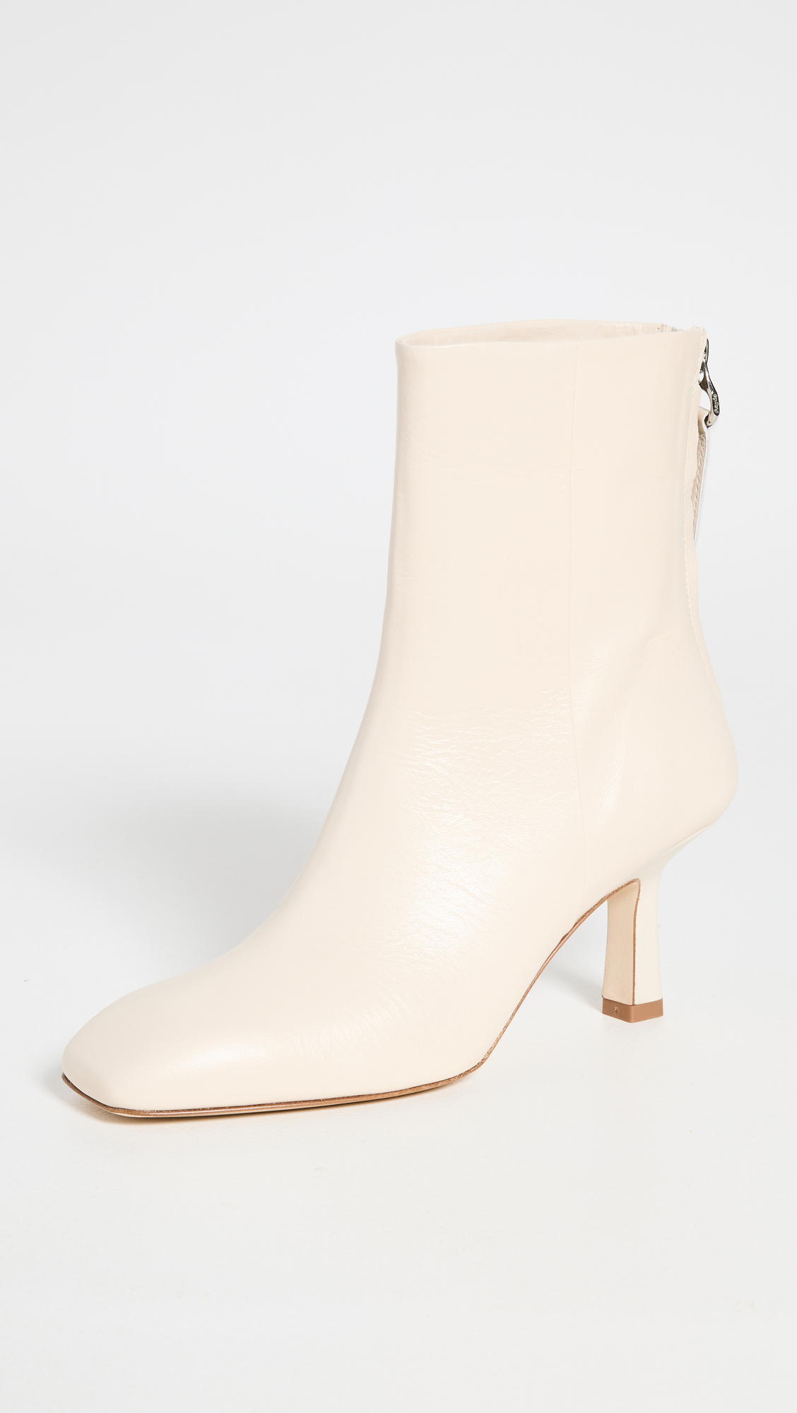9 Stylish White-Boot Outfits to Wear Year-Round | Who What Wear