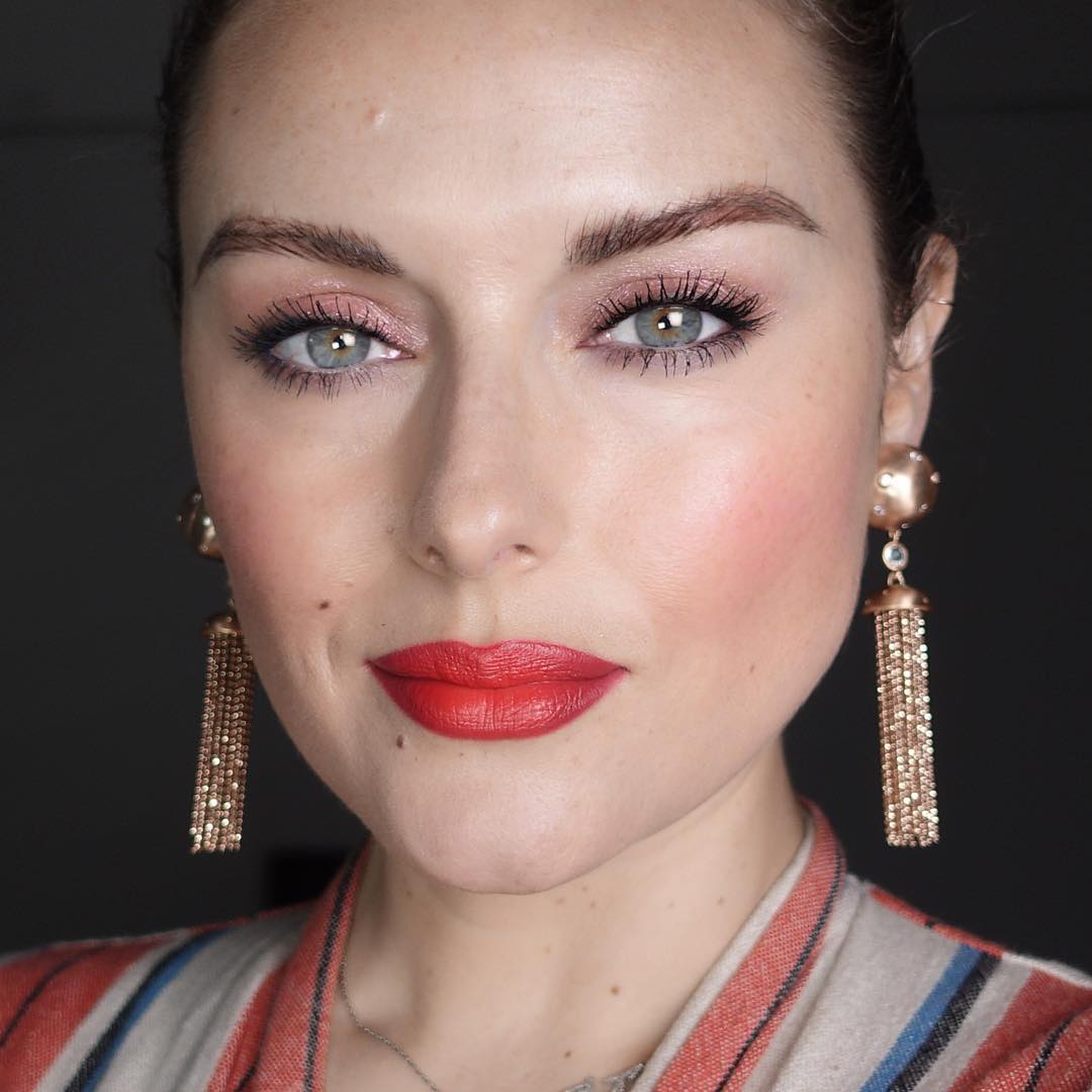 Pink and red makeup trending: Katie Jane Hughes wearing pink eyeshadow and satin red lip