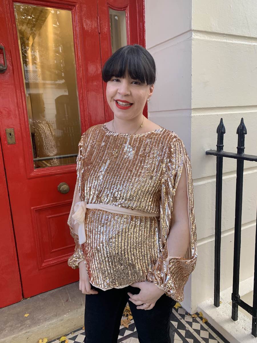 Best Concealers: Mica Ricketts wearing sequin ASOS maternity top and red lipstick