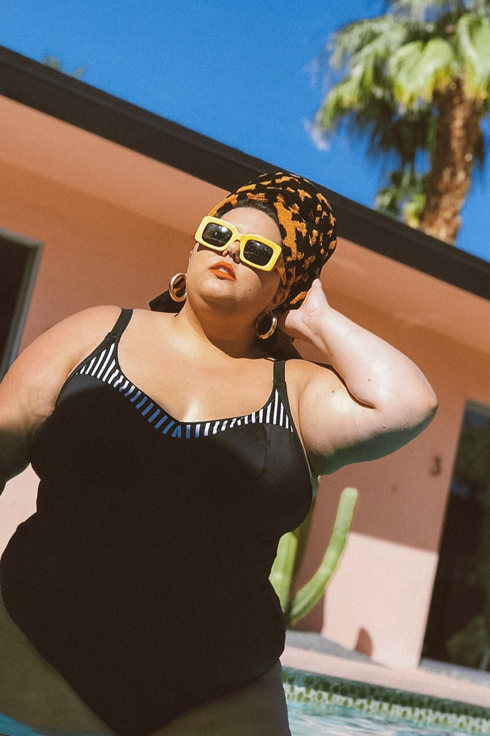 best swimwear brands for big boobs: Callie Thorpe in a monochrome swimsuit