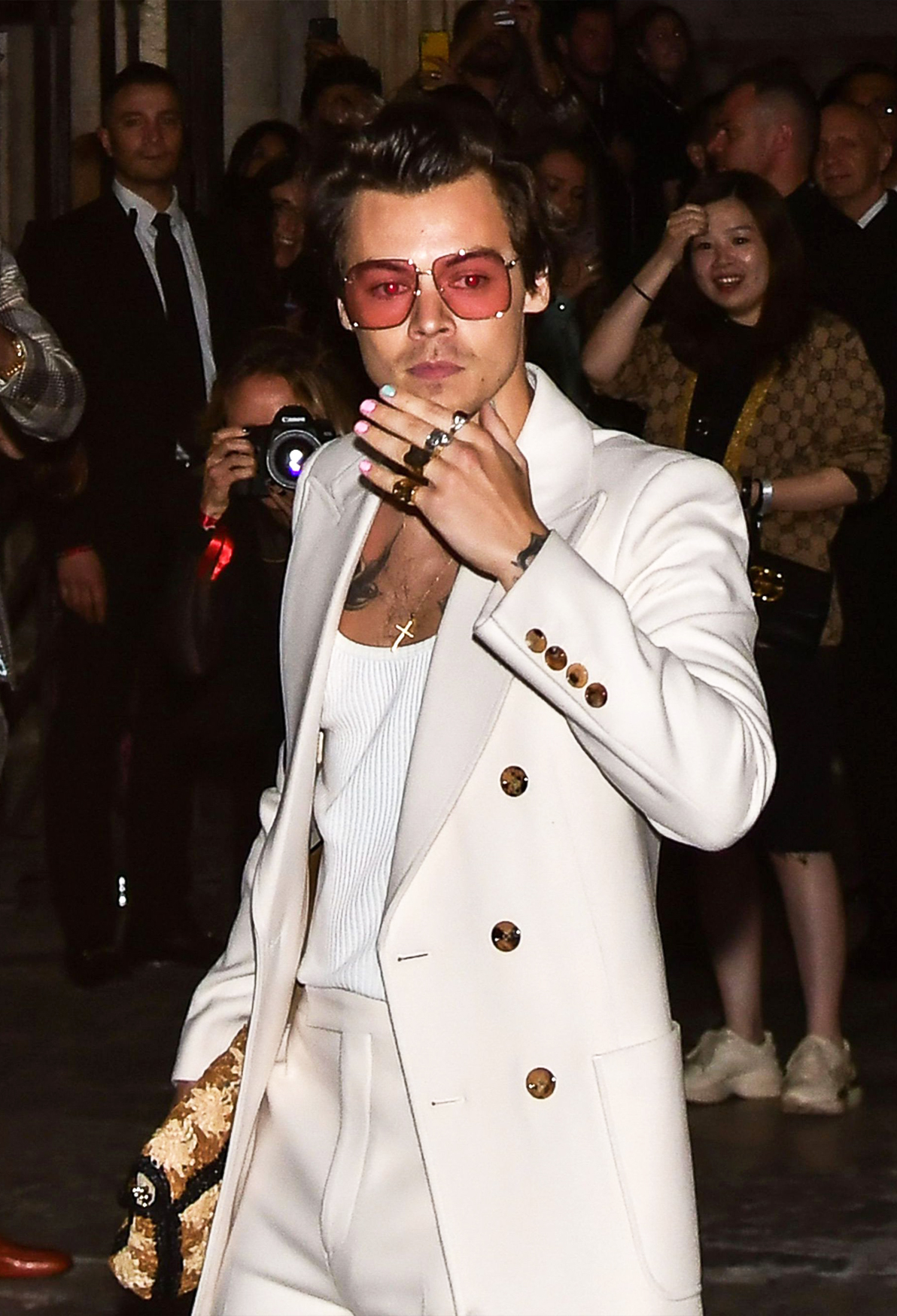 Gucci Harry Styles outfit: White suit and pastel manicure