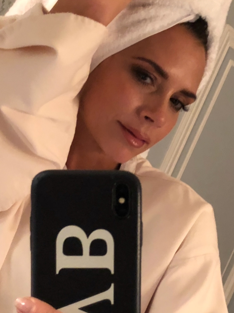 Victoria Beckham Skincare: VB wearing head towel and robe