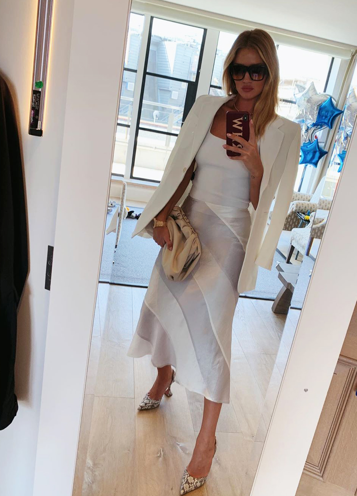 Rosie Huntington Whiteley london summer outfits: slip skirt and white blazer