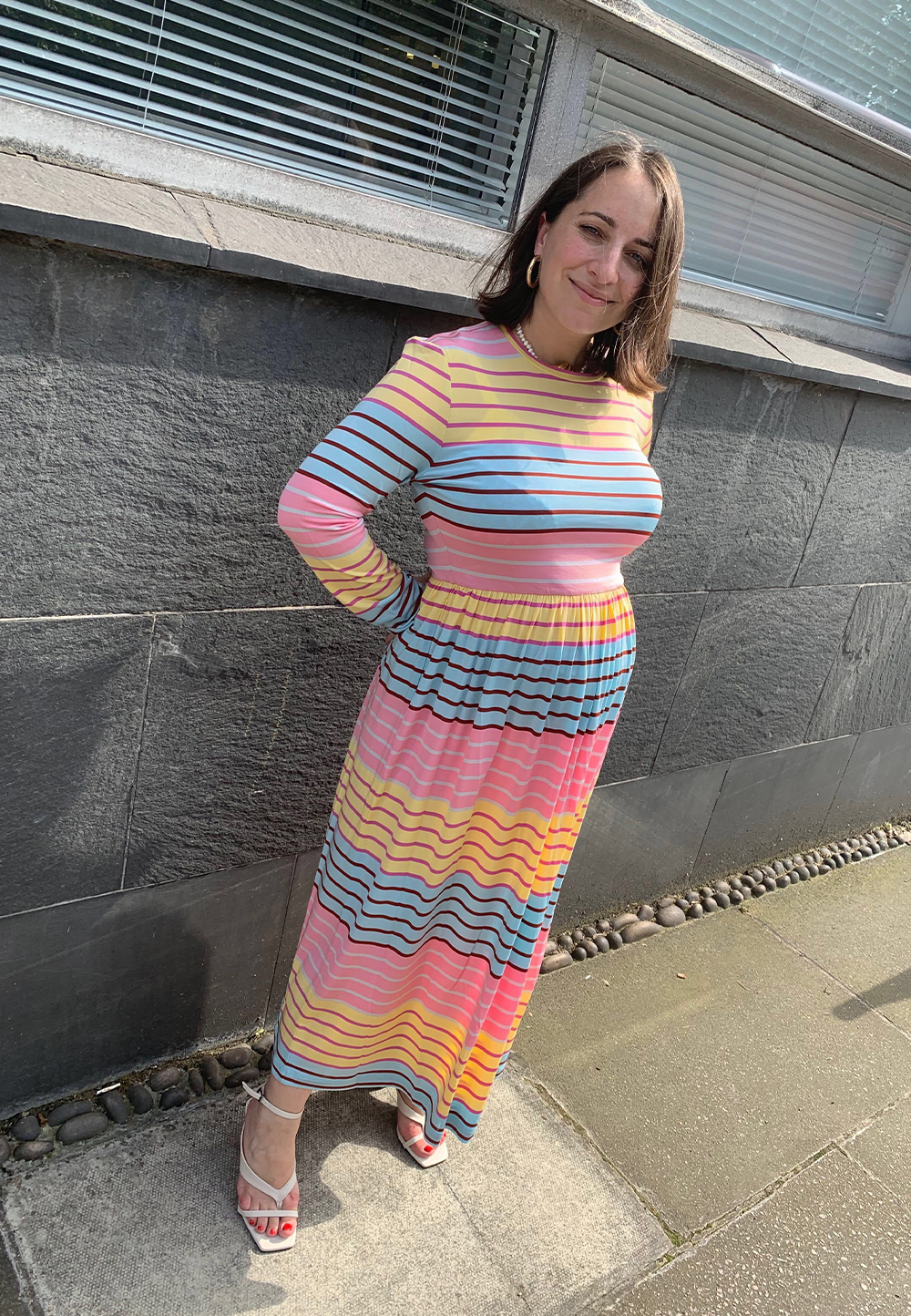 Maternity work outfits: striped dress with white sandals