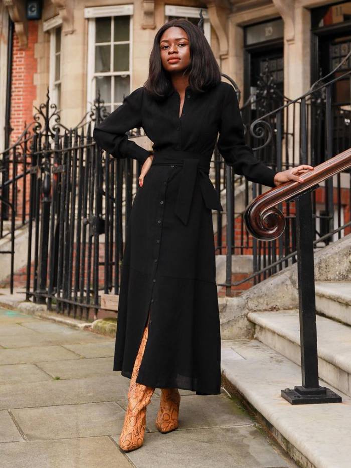 best winter dresses 2019: eni's wardrobe influencer wearing a black Cefinn dress