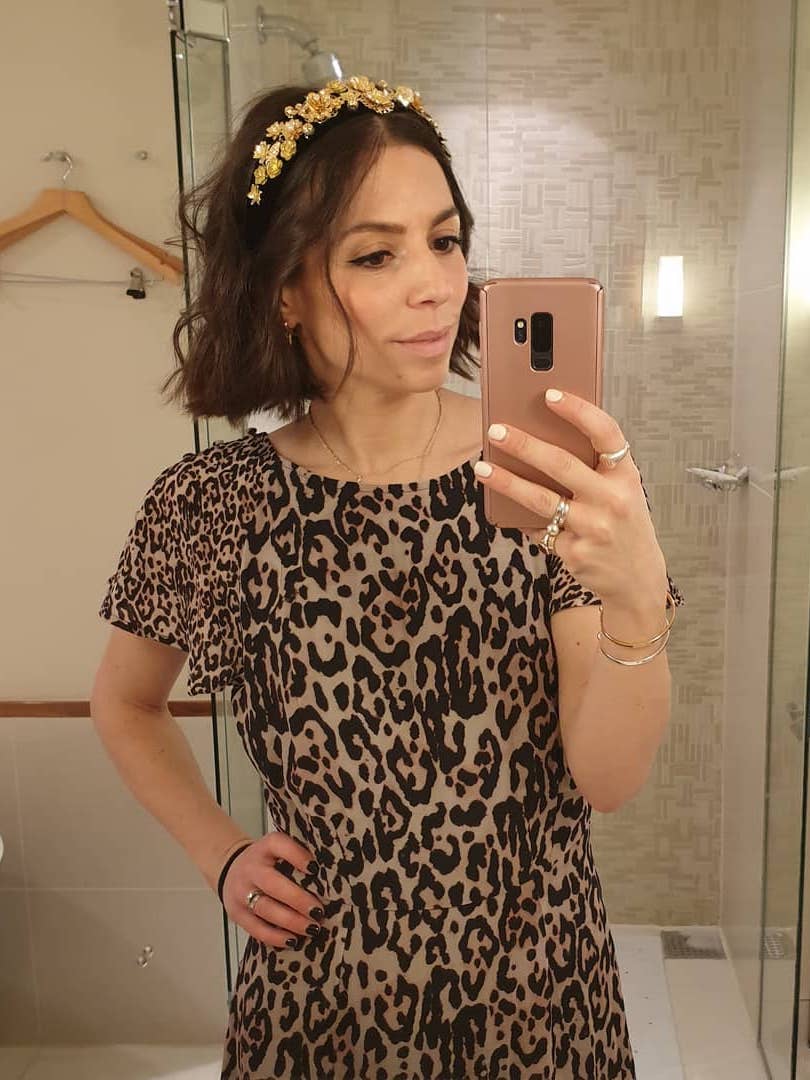 Gemma Rose Breger Makeup Bag Cost: Gemma wearing leopard print dress