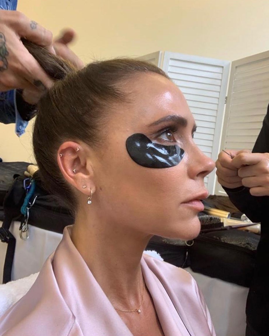 Under-eye patches: Victoria Beckham wearing them backstage