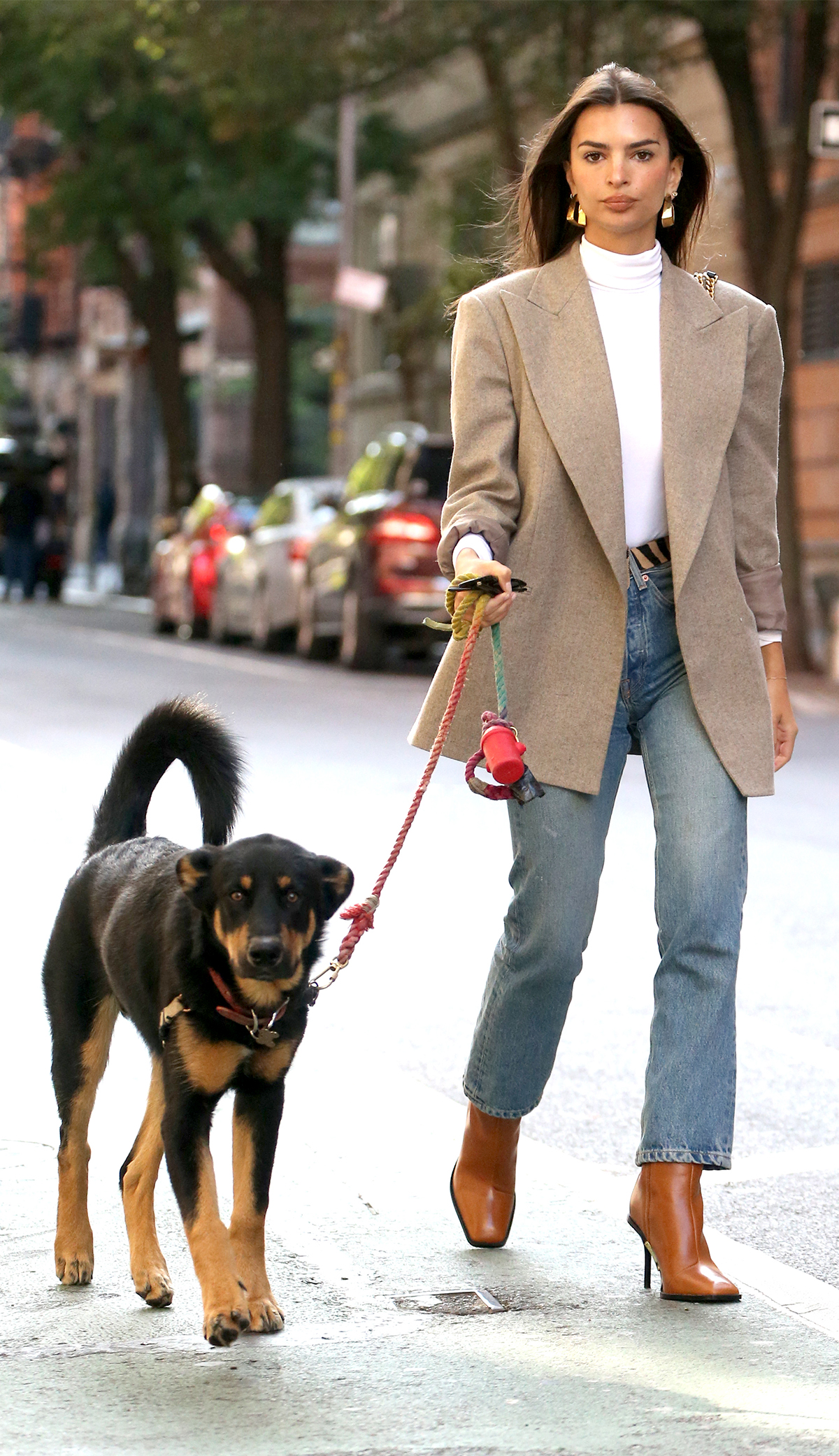 Emily Ratajkowski walking dog in jeans and blazer outfit
