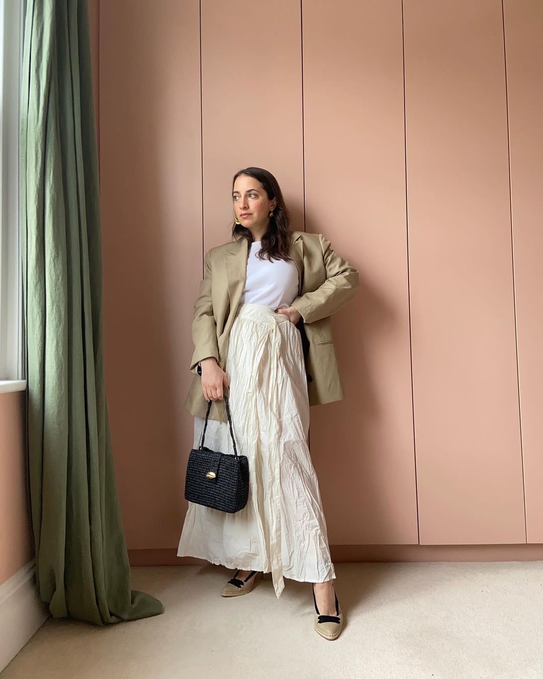 Marks and Spencer editor picks: @hannahalmassi wears a beige blazer and maxi skirt