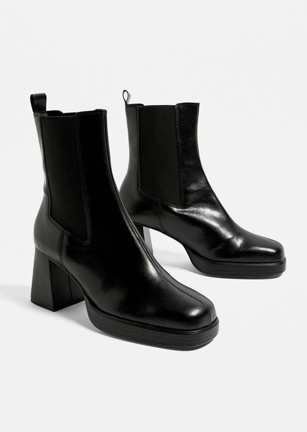 expensive black boots