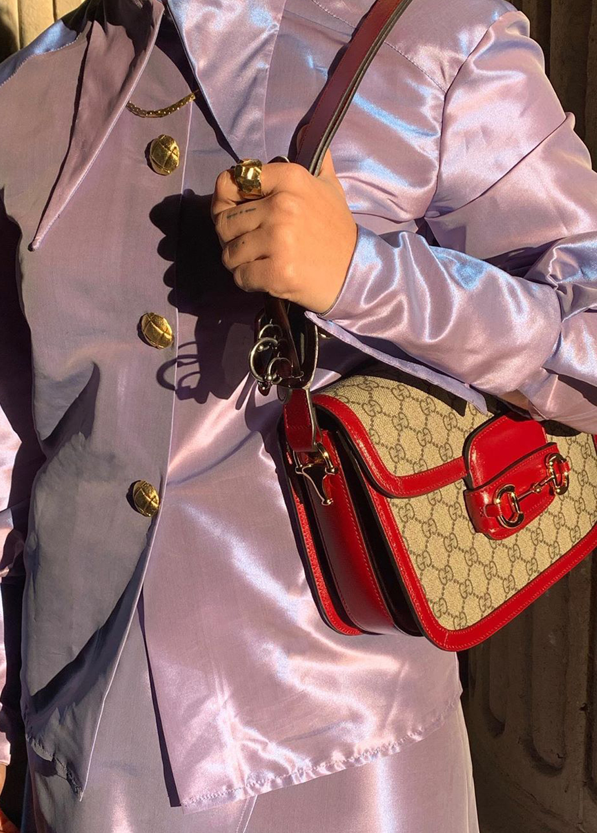 Best designer handbags 2020: Gucci 1955 bag as seen on influencer maria bernad in a purple jacket