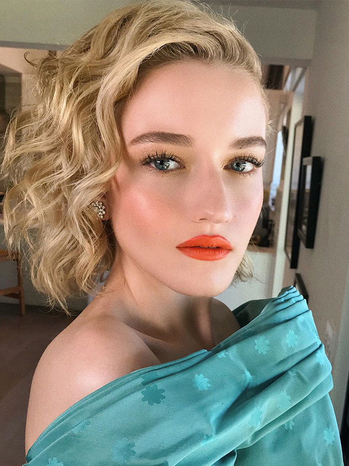 Blonde Bob Hairstyles to inspire: Julia Garner's blonde bob that's swept to the side