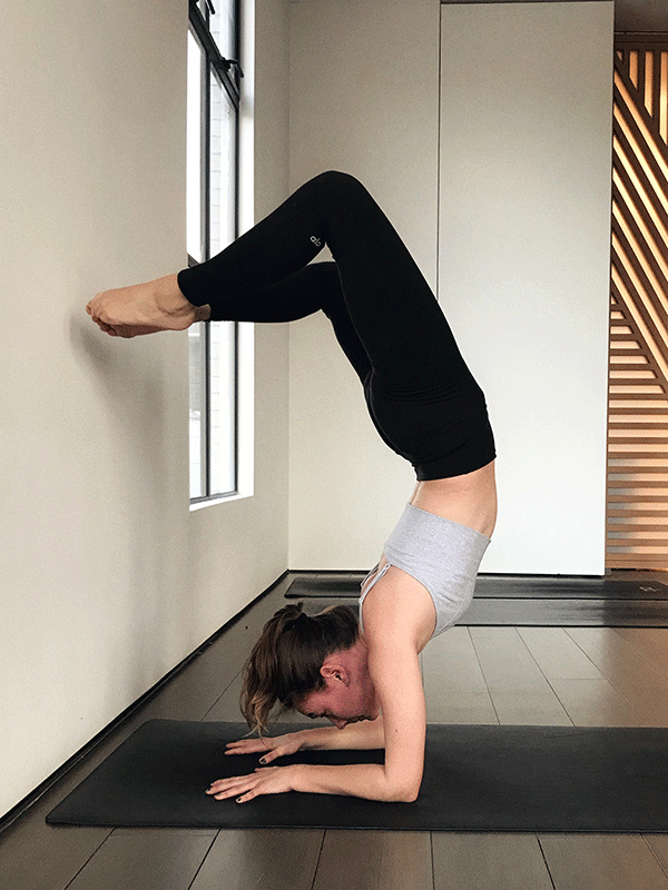 Headstand and Wall