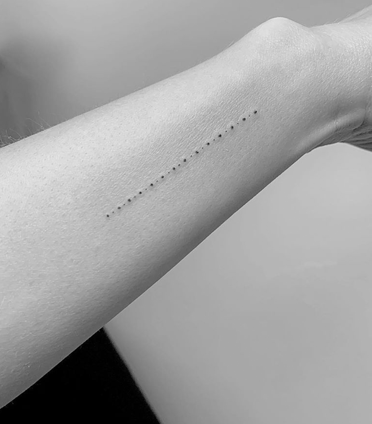 Fine line tattoo