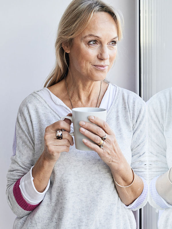 Older Woman Drinking Coffee