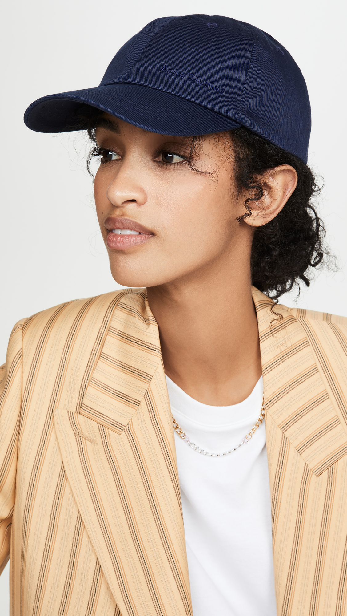 How to Style a Baseball Hat to Look Chic | Who What Wear