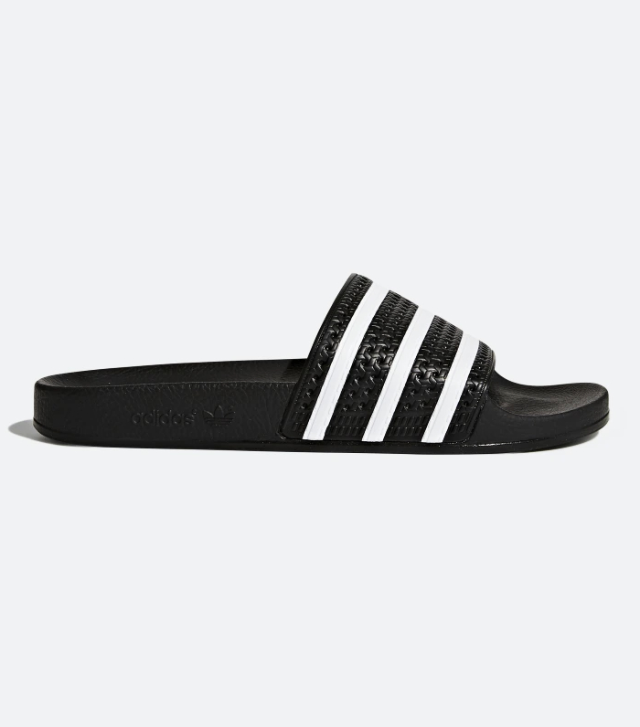 I Think Adidas Slides Look Good With Every Kind Of Outfit Who What Wear