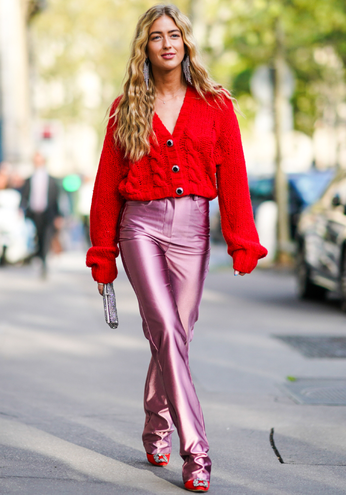 best street style outfits: emili sindlev wearing a red jumper and pink trousers