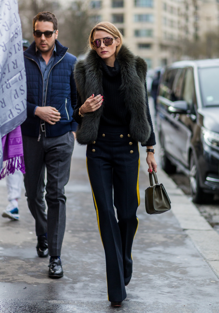 best street style outfits: olivia palermo wearing a gilet with blue jeans