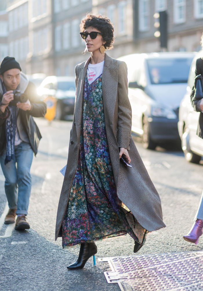 best street style outfits: yasmin sewell wearing a floral dress, vetements boots, grey coat