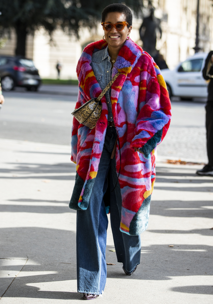 best street style outfits: tamu mcpherson in a super cool oversized red fluffy coat
