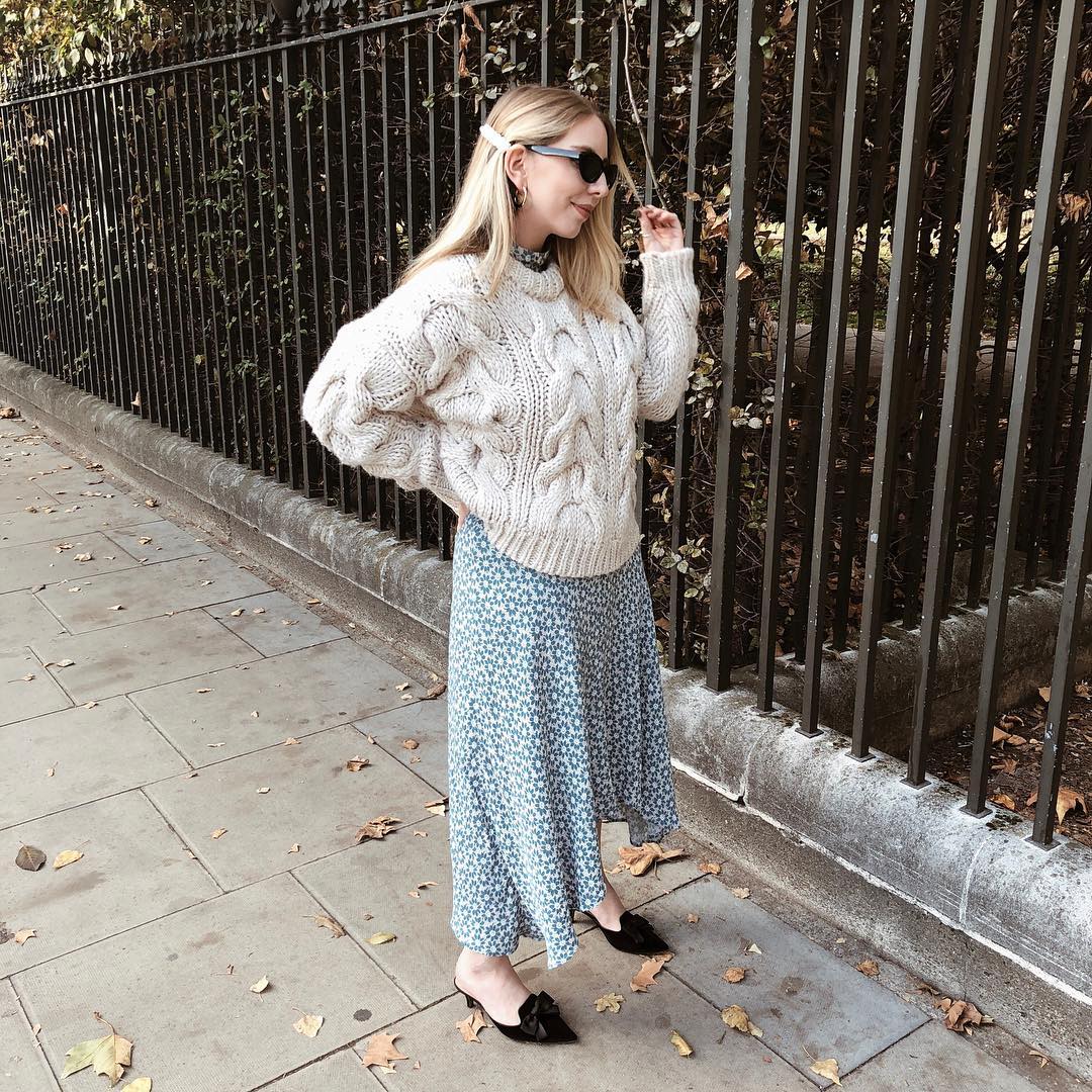 Revolution Concealer: @MAXINEEGGENBERGER wearing a blue printed dress and chunky knit