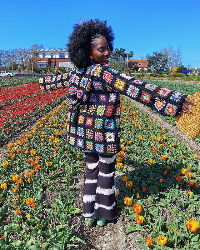 Autumn Knitwear Trends 2021: @michelleamo_ wears a crochet hooded jacket
