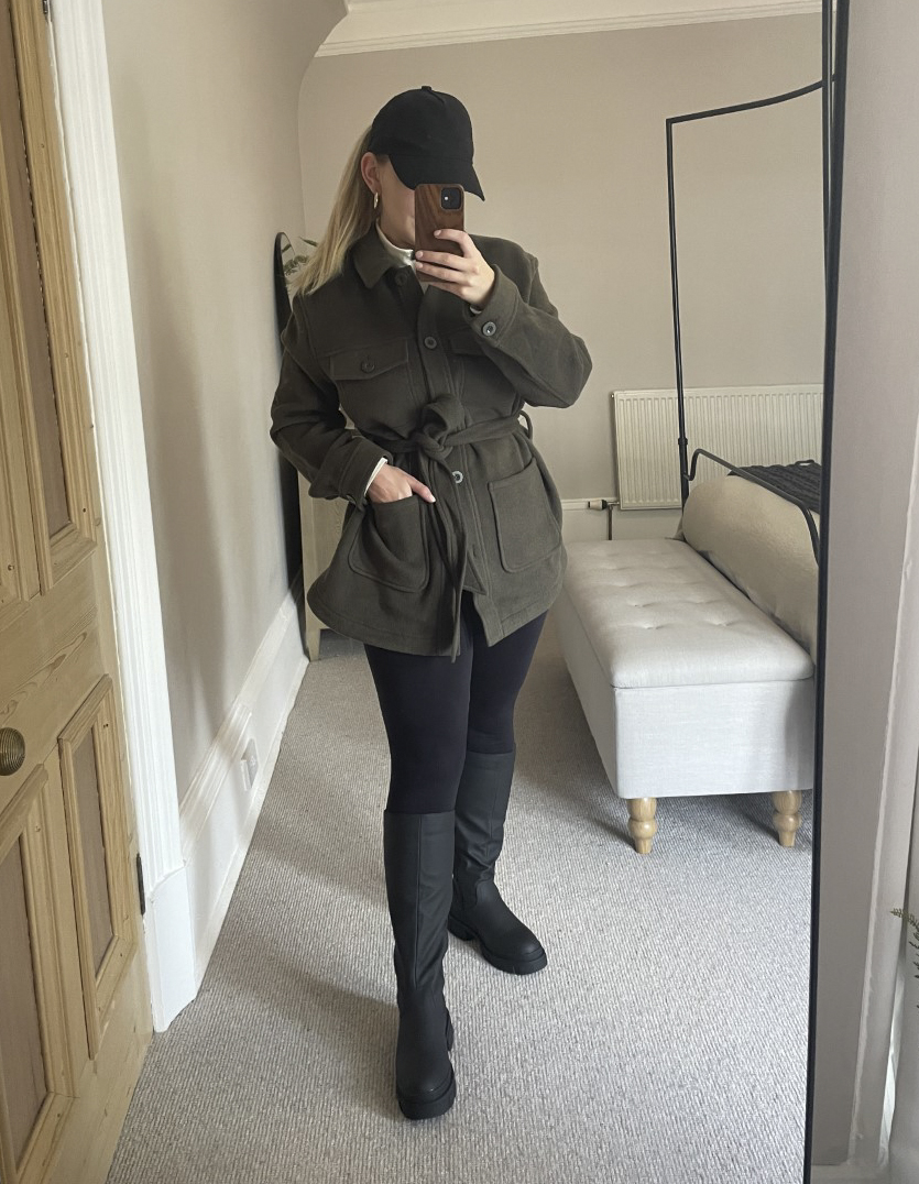 Chunky Knee-Boot Outfits: A shacket, leggings, and a baseball cap