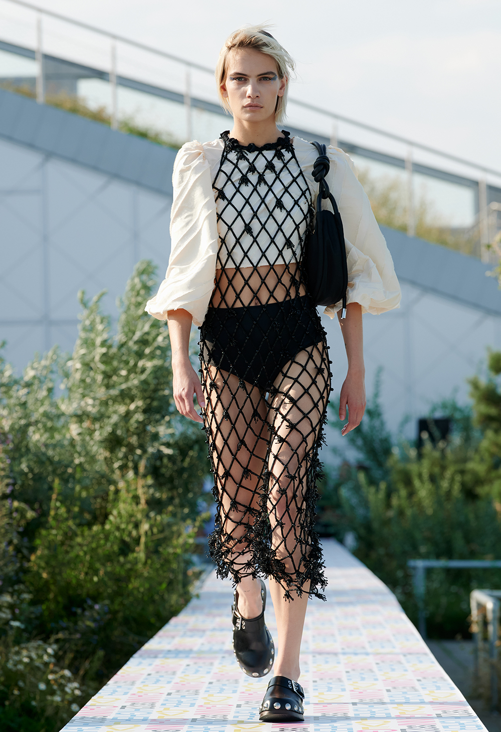 spring/summer 2022 fashion trends: fishnet dress at Ganni