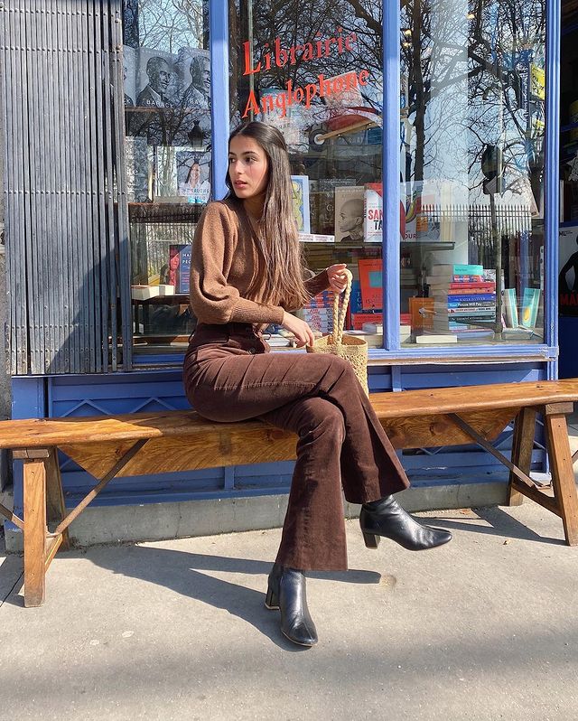 French Girl Corduroy Outfits: @tamaramory wears a pair of brown corduroy trousers