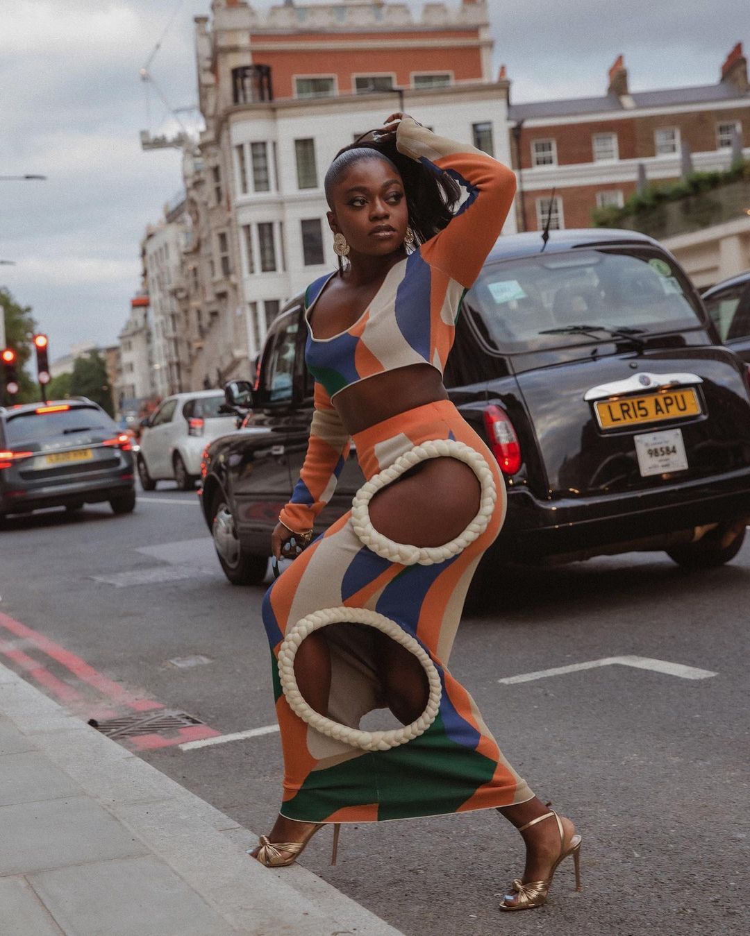 Extreme Cut-Out Dresses: @fisayolonge wears a skirt and top from Kai Collective