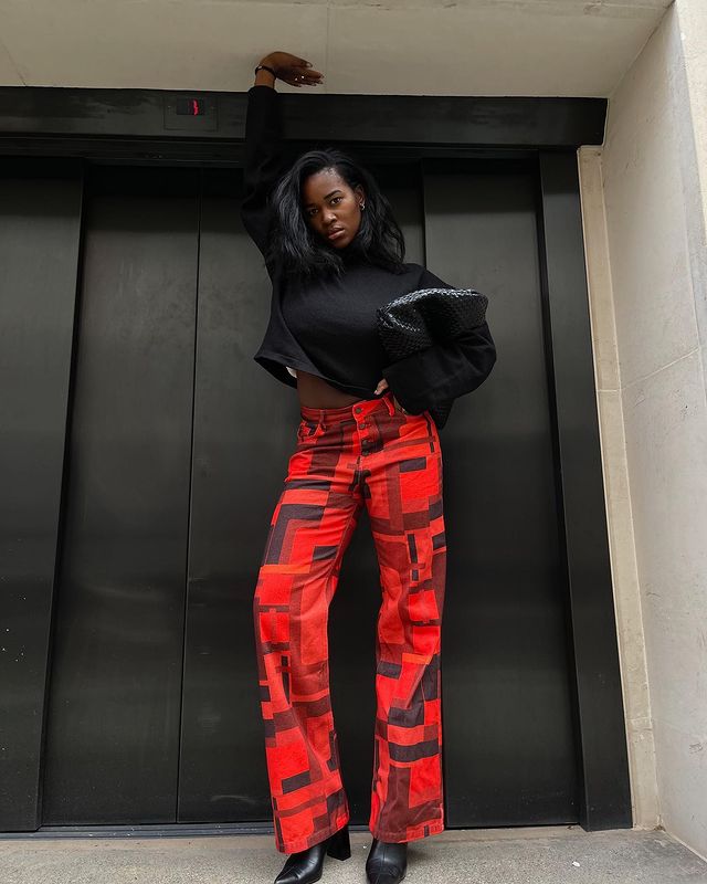 Easy Winter Outfits: @nlmarilyn wears a pair of statement printed trousers with a black roll-neck
