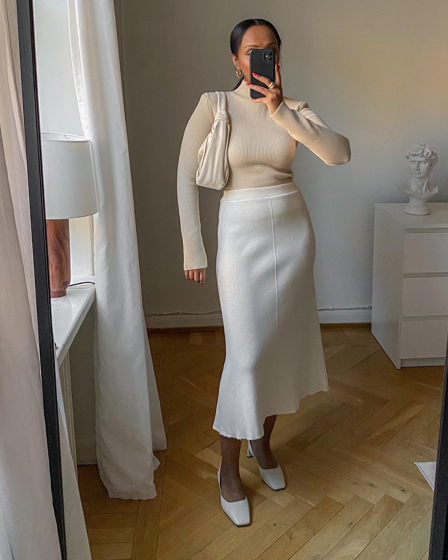 30 Pretty Midi Skirts Seen All Over New York Fashion Week  Who What Wear