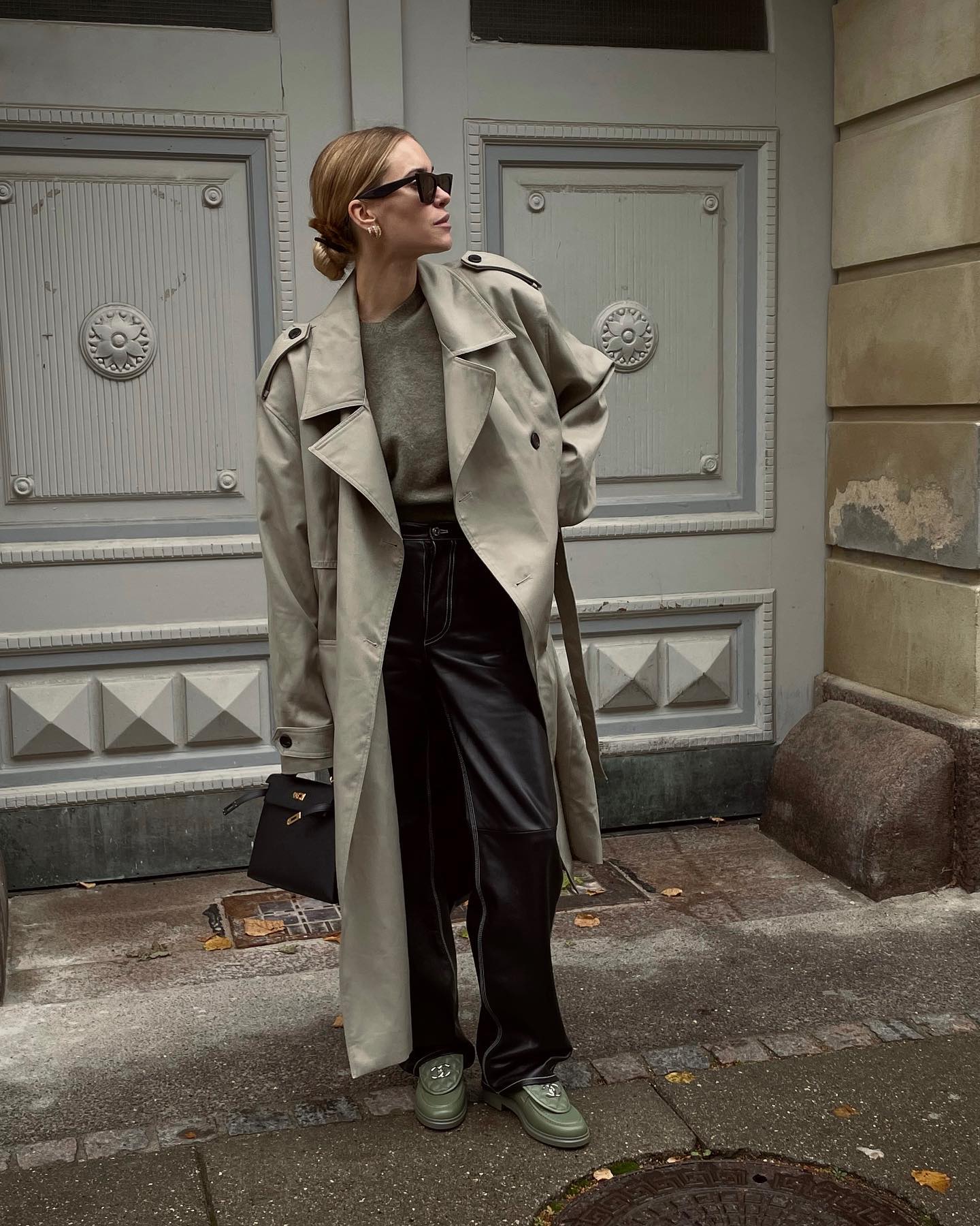 Pernille Teisbaek wearing Chanel loafers with trench coat