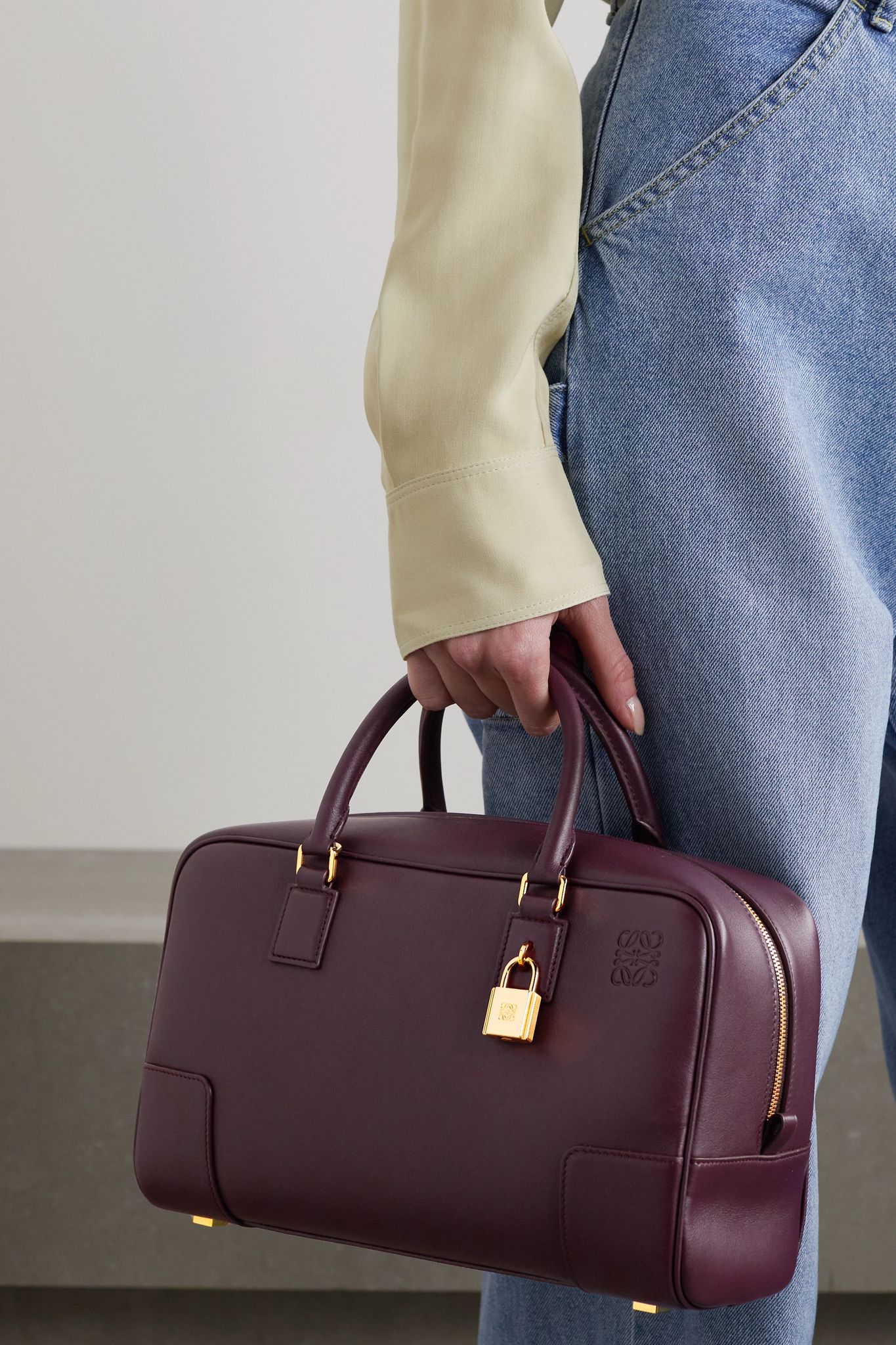 the ultimate designer bag list: 10+ bags that fit your work laptop