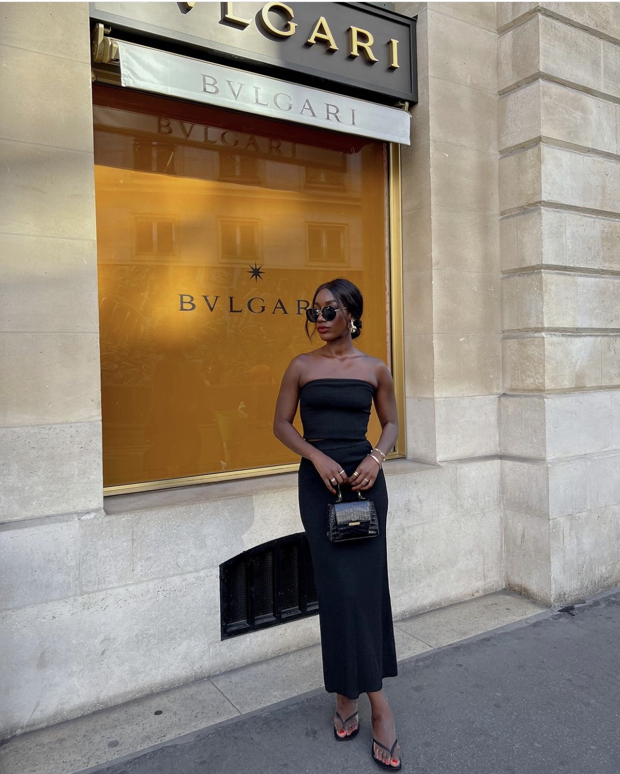 French Girl Dress Trends: @aida.bdji wears a black dress