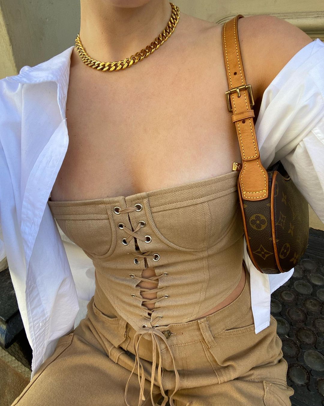 Corset Top Outfits: @maggie_mccormack wears a lace-up beige corset top