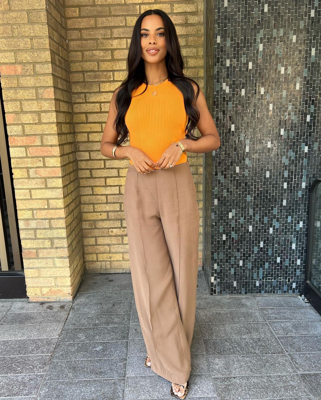 Rochelle Humes Mango Trousers: Rochelle Humes styles a pair of tan tailored trousers with an orange knit