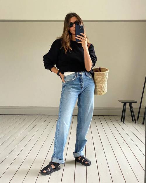 Marianne wearing fisherman sandals and jeans