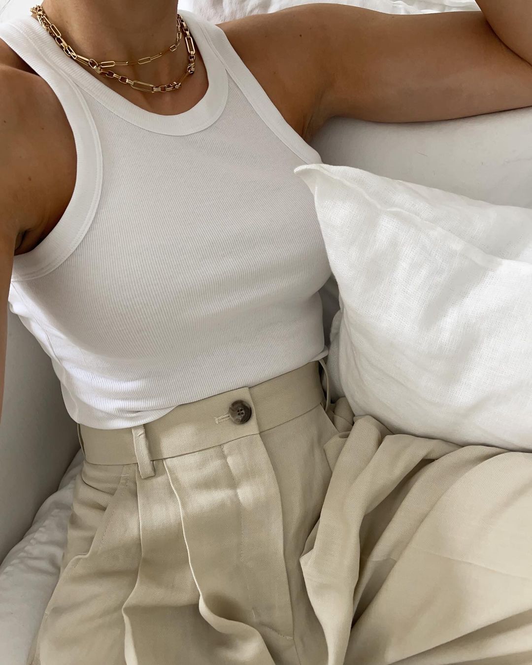 How to Style a Tank Top: @_jessicaskye wears a tank top with lightweight tailored trousers