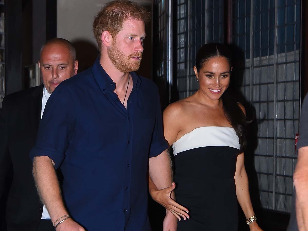 Meghan Markle in a monochrome jumpsuit with Prince Harry in NYC