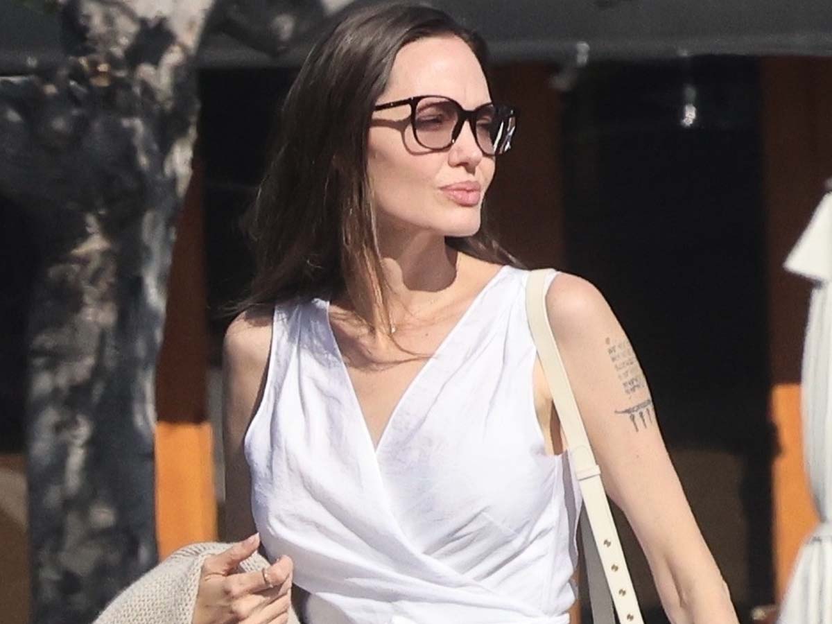 Angelina Jolie Wore Flats With Summer's Prettiest Dress | Who What Wear