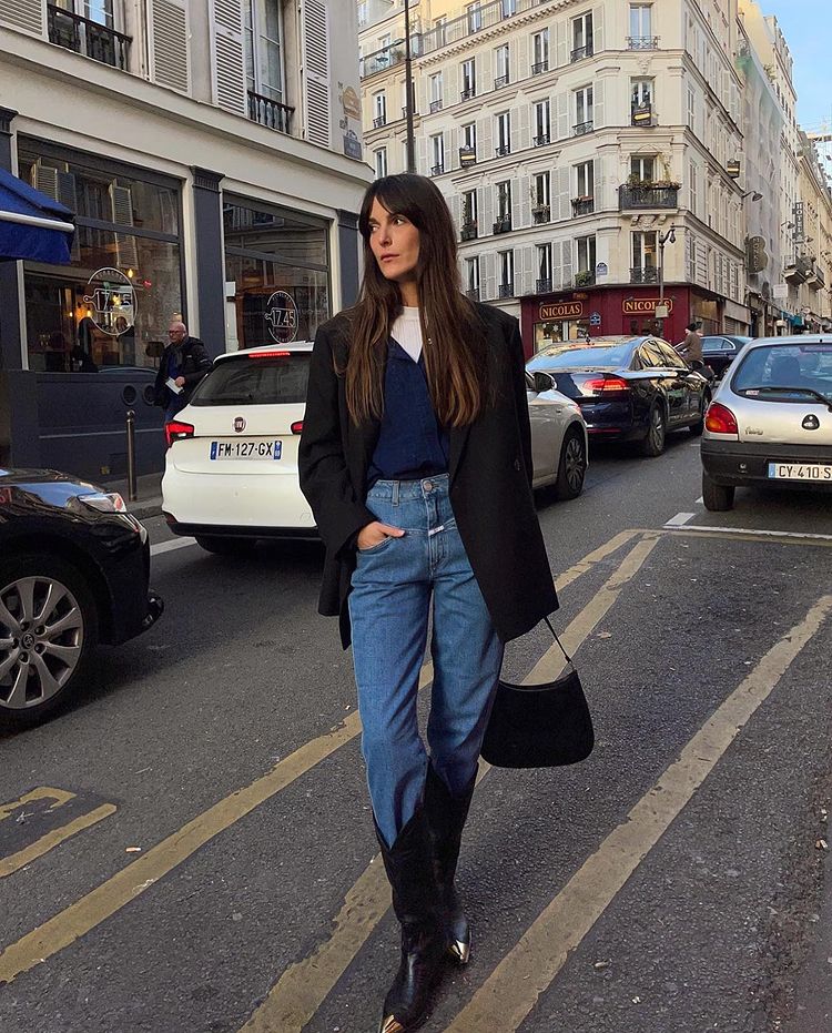 French girl autumn shoes: @leiasfez styles western boots with blue jeans and a black blazer