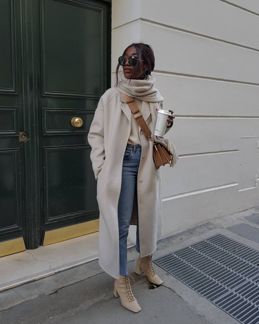 The Best Wardrobe Basics To Wear With Boots This Autumn: @aida.bdji wears straight leg jeans with heeled ankle boots